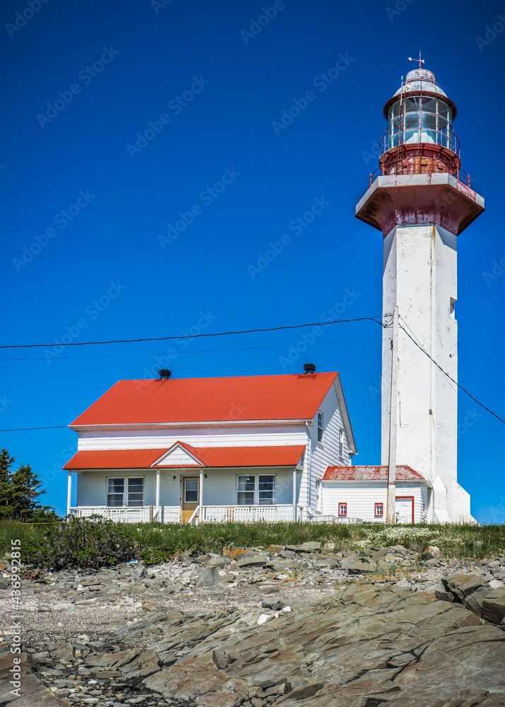 View on the Pointe Mitis lighthouse on a sunny morning (Located in the province of Quebec, Canada)