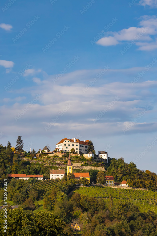 Kapfenstein castle and church with vineyard, Styria, Austria