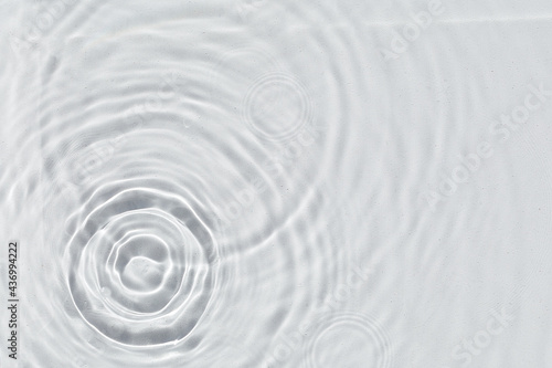 Abstract water texture, surface with drops, rings and ripple.