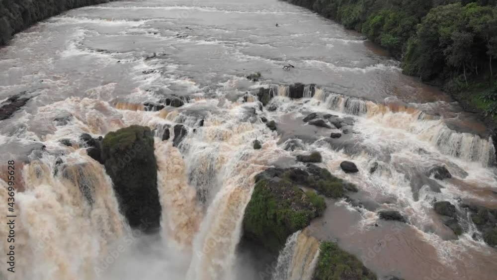 Monday River Falls aerial, a high flow misty waterfall in Paraguay Monday River Falls aerial, a high flow misty waterfall in Paraguay