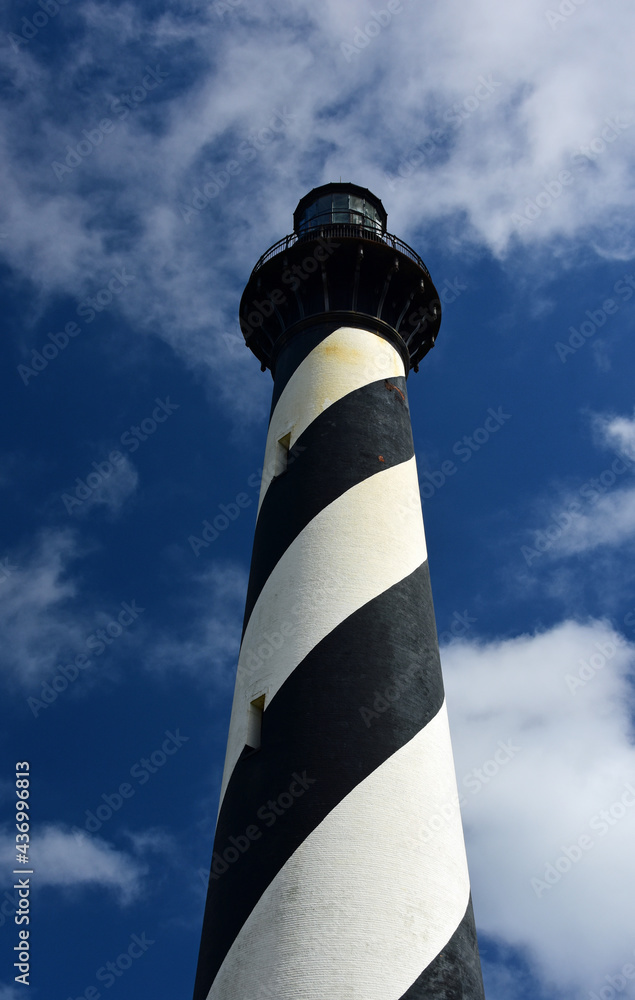 black and white striped  relocated cape hatteras lighthouse on a sunny spring day on the atlantic ocean coast in buxton, north carolina