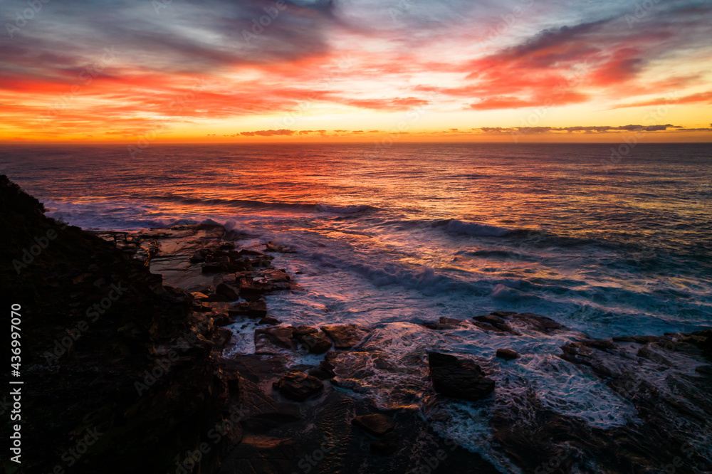 Aerial Sunrise Seascape at Rocky Inlet with colourful high cloud Aerial Sunrise Seascape at Rocky Inlet with colourful high cloud