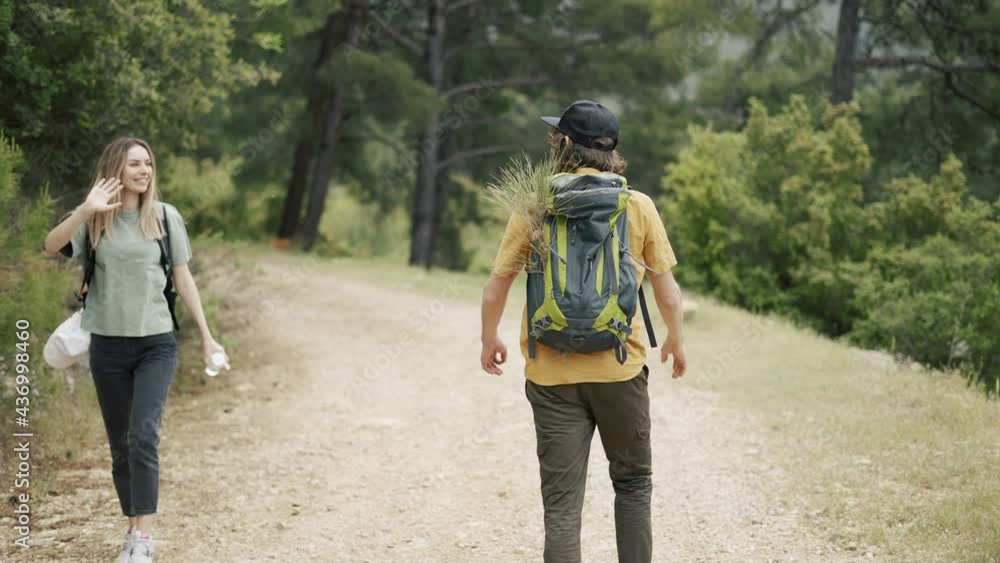 Two travelers say hello and greeting in forest Two travelers say hello and greeting in forest