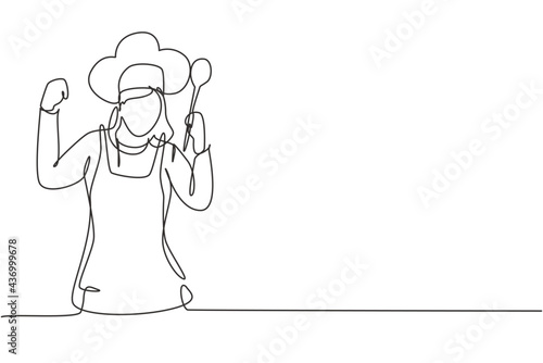 Single one line drawing female chef with celebrate gesture, holding spoon and wearing apron is ready to cook meals for restaurant guests. Modern continuous line draw design graphic vector illustration