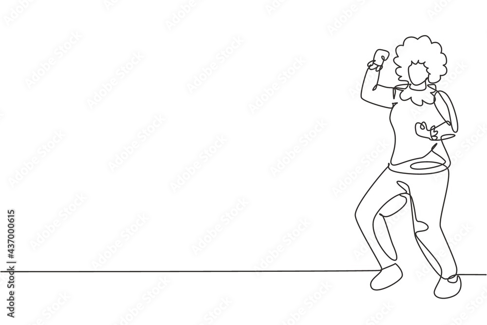 Single continuous line drawing female clown stands with celebrate gesture wearing wig and clown costume ready to entertain audience in circus arena. One line draw graphic design vector illustration