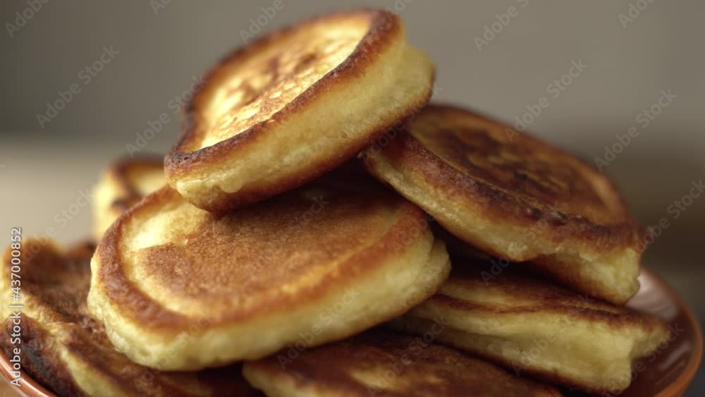 Cooked pancakes. Fried pancakes. Tasty breakfast. National dish. Afternoon tea with tea. Object tilt. Close-up. Cooked pancakes. Fried pancakes. Tasty breakfast. National dish. Afternoon tea with tea. Object tilt. Close-up.
