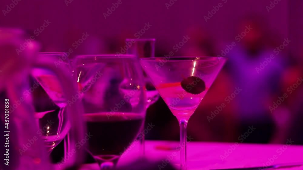 Cocktail Drinks At Wedding Ceremony Party, People Dancing in Background, Close Up Cocktail Drinks At Wedding Ceremony Party, People Dancing in Background, Close Up