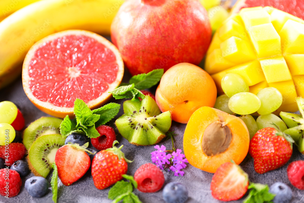 assorted of healthy fruits and berries background assorted of healthy fruits and berries background