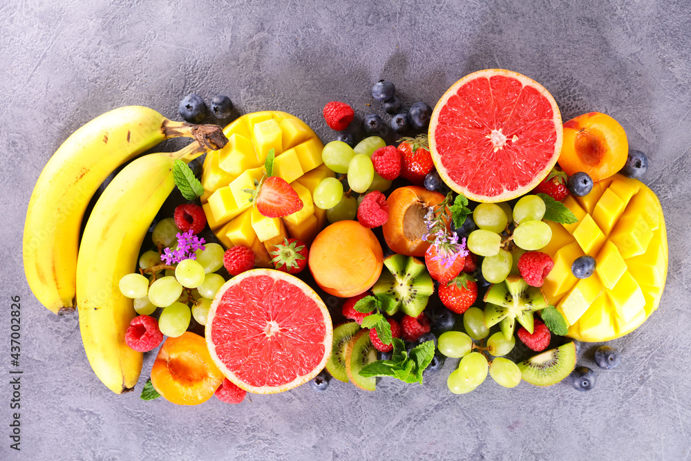 assorted of healthy fruits and berries background assorted of healthy fruits and berries background