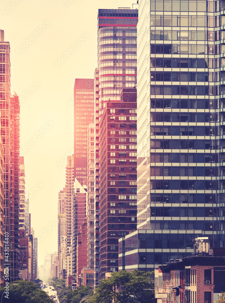 Obraz premium Color toned picture of Manhattan cityscape at sunset, New York City, USA.