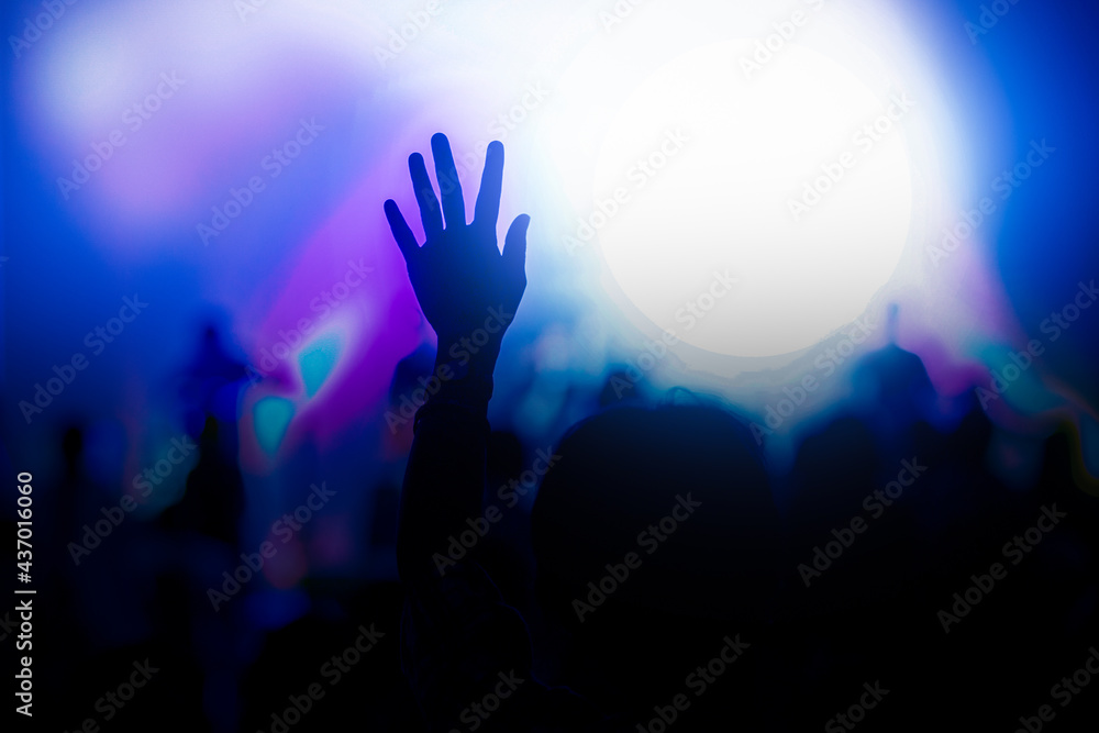 Hand raise up to praise God in a concert. 
