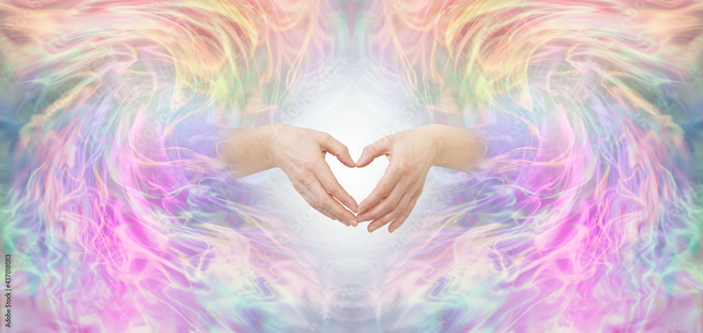 Sending healing Unconditional Love to you - female hands making a heart shape surrounded by a complex beautiful multi coloured energy field with copy space all around
Sending healing Unconditional Love to you - female hands making a heart shape surrounded by a complex beautiful multi coloured energy field with copy space all around