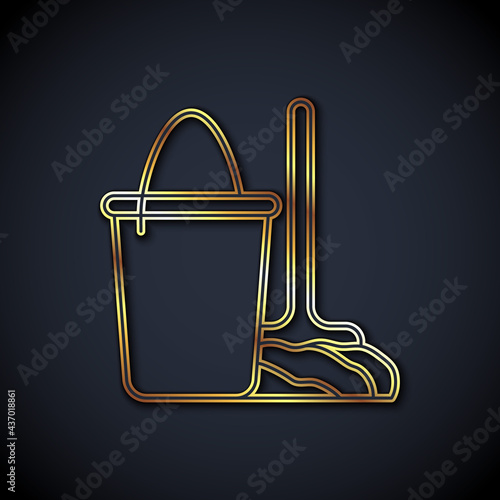 Gold line Mop and bucket icon isolated on black background. Cleaning service concept. Vector