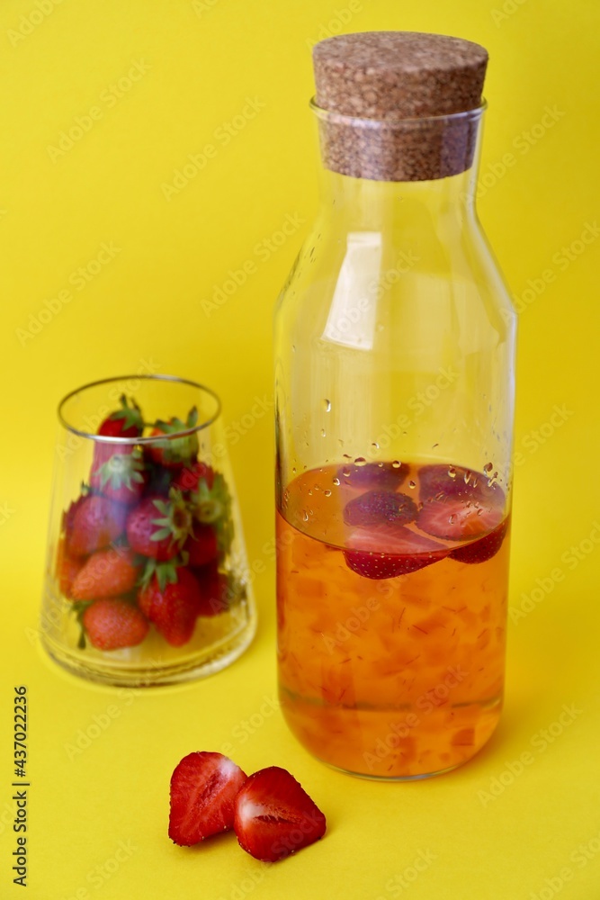 bottle of juice and strawberries bottle of juice and strawberries