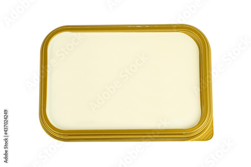 Isolated plastic packaging of butter with clipping path on white background