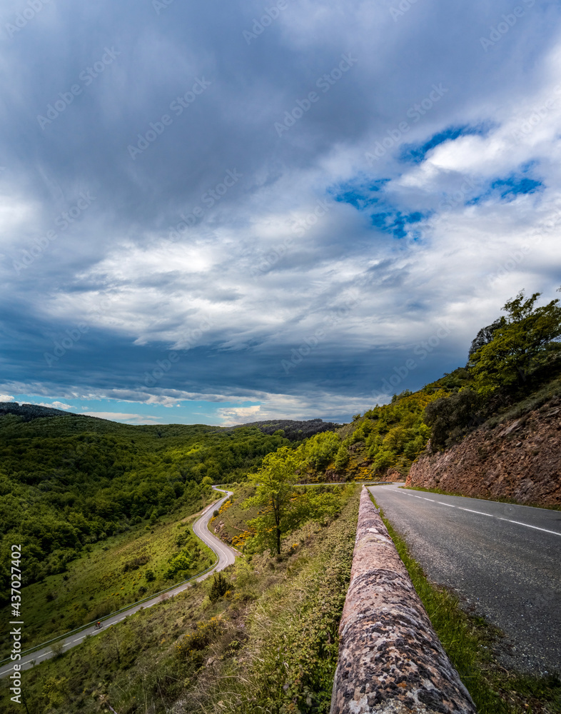 Spectacular mountain pass with curved road, top view Spectacular mountain pass with curved road, top view
