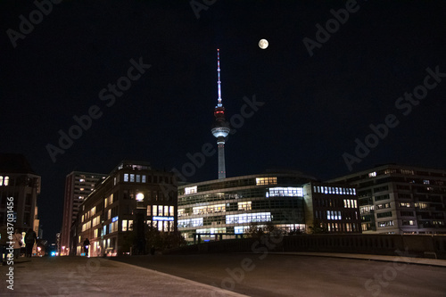 Berlin cityscape with fullmoon