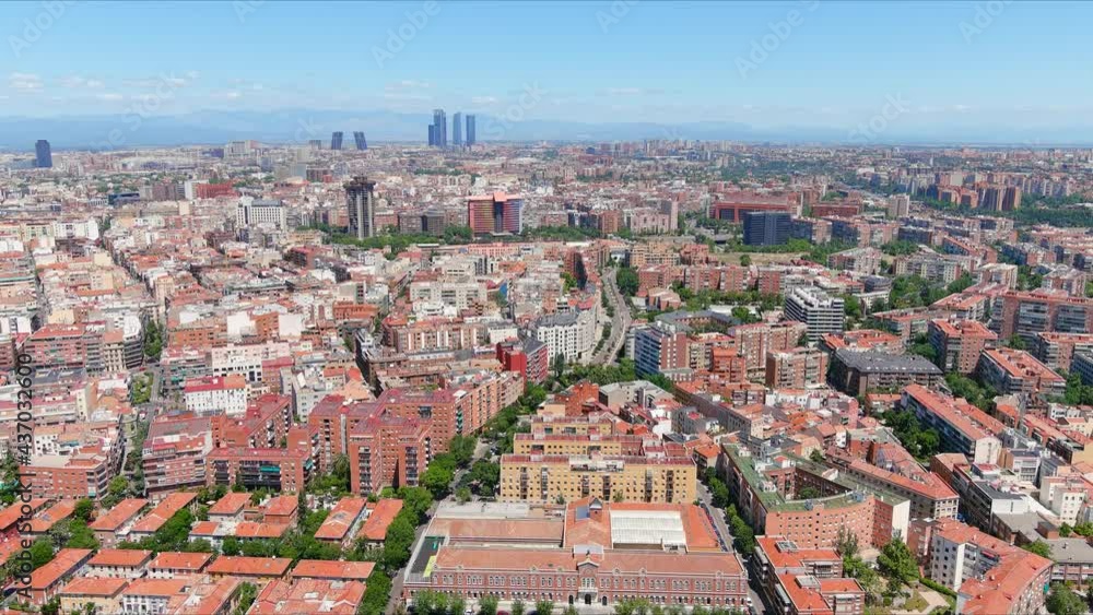 Madrid: Aerial view of capital city of Spain, modern office buildings (skyscrapers) skyline in background - landscape panorama of Europe from above
Madrid: Aerial view of capital city of Spain, modern office buildings (skyscrapers) skyline in background - landscape panorama of Europe from above