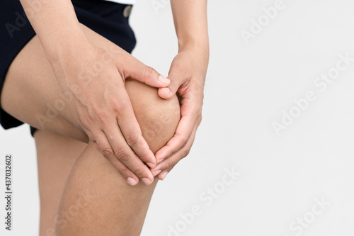 Wallpaper Mural Health care concept. Woman suffering from pain in knee, closeup Torontodigital.ca