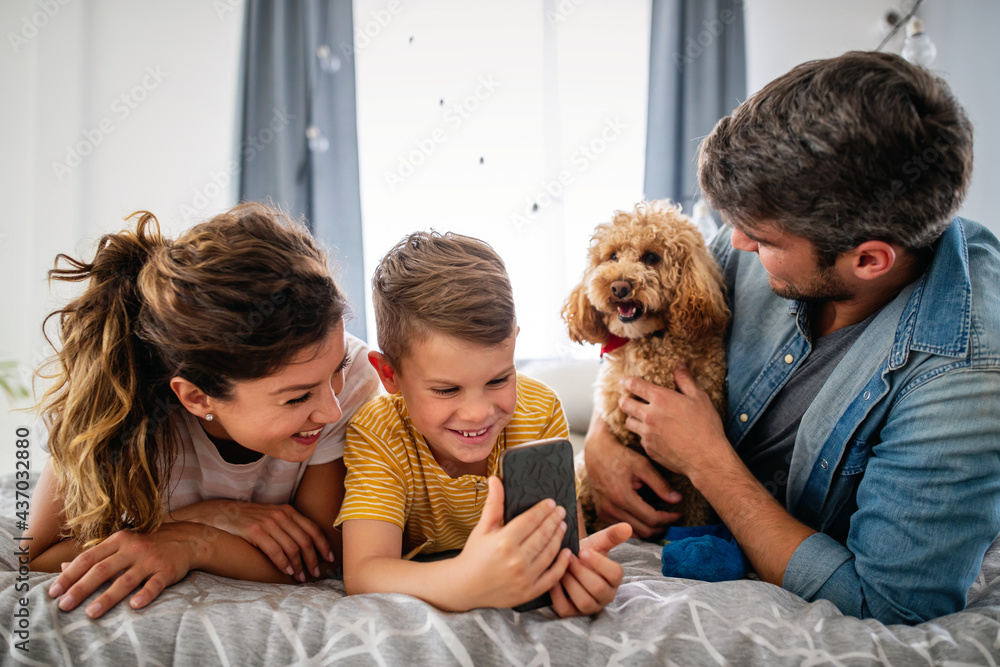 Happy young family having fun together at home. Happy childhood concept Happy young family having fun together at home. Happy childhood concept