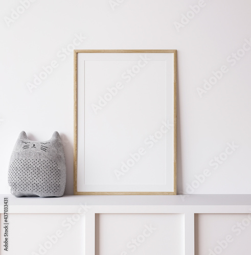 Poster mockup in minimal nursery design, wooden frame on white interior background, 3d render