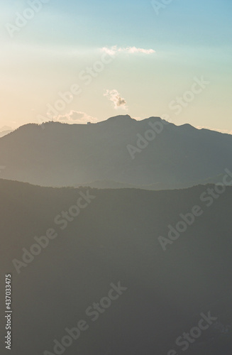 Sunset over the alps during spring near the city of Como, Italy - May 2021. photo