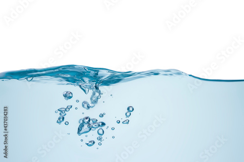 Blurred waves create unusually shaped bubbles that exude freshness. in a light blue liquid