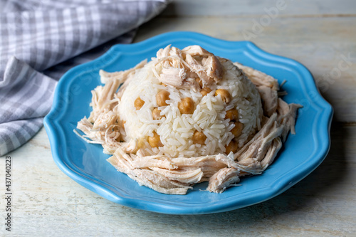 Traditional delicious Turkish food; Rice with chickpeas and chicken (Turkish name; Tavuklu nohutlu pilav or pilaf) photo