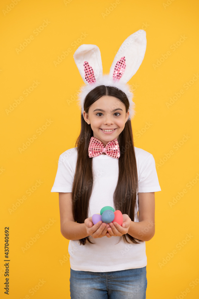 happy easter kid girl in bunny ears and bow tie hold painted eggs, egg hunt happy easter kid girl in bunny ears and bow tie hold painted eggs, egg hunt
