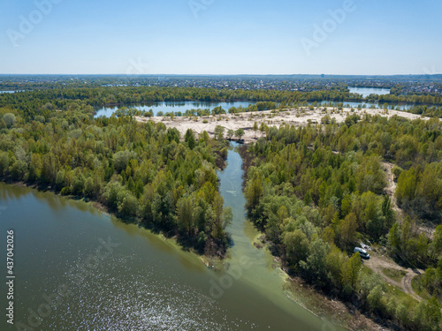 Lake shore in spring. Aerial drone view.