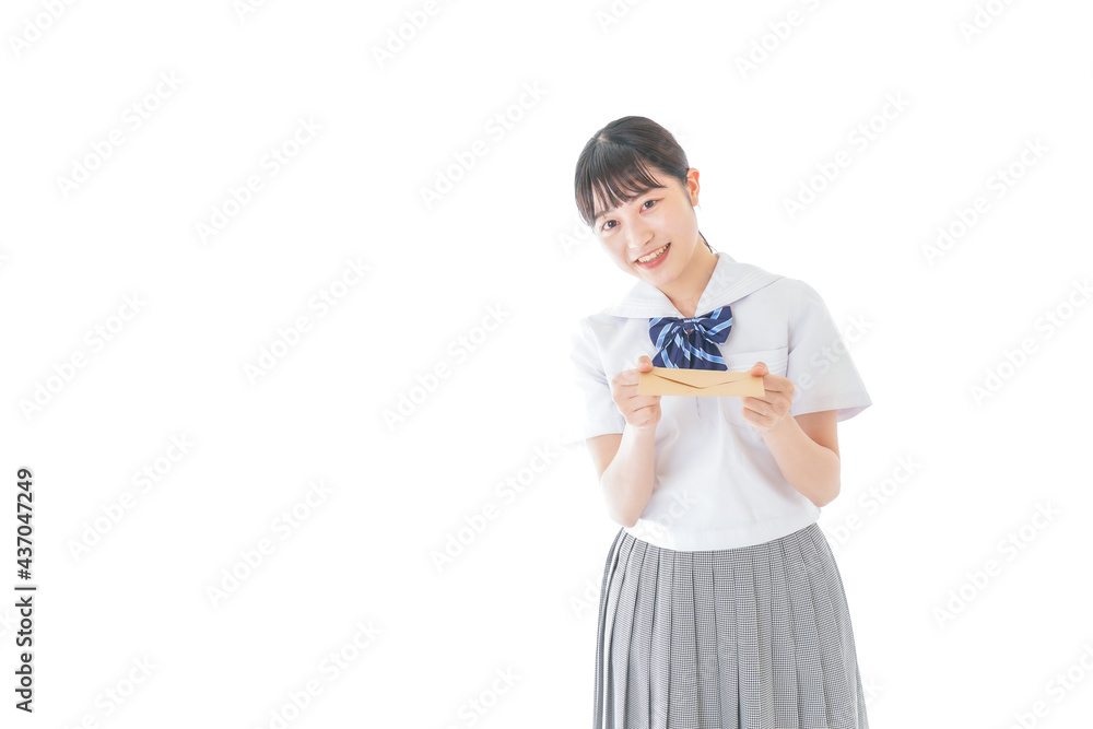 手紙を手渡す制服姿の女子学生 手紙を手渡す制服姿の女子学生