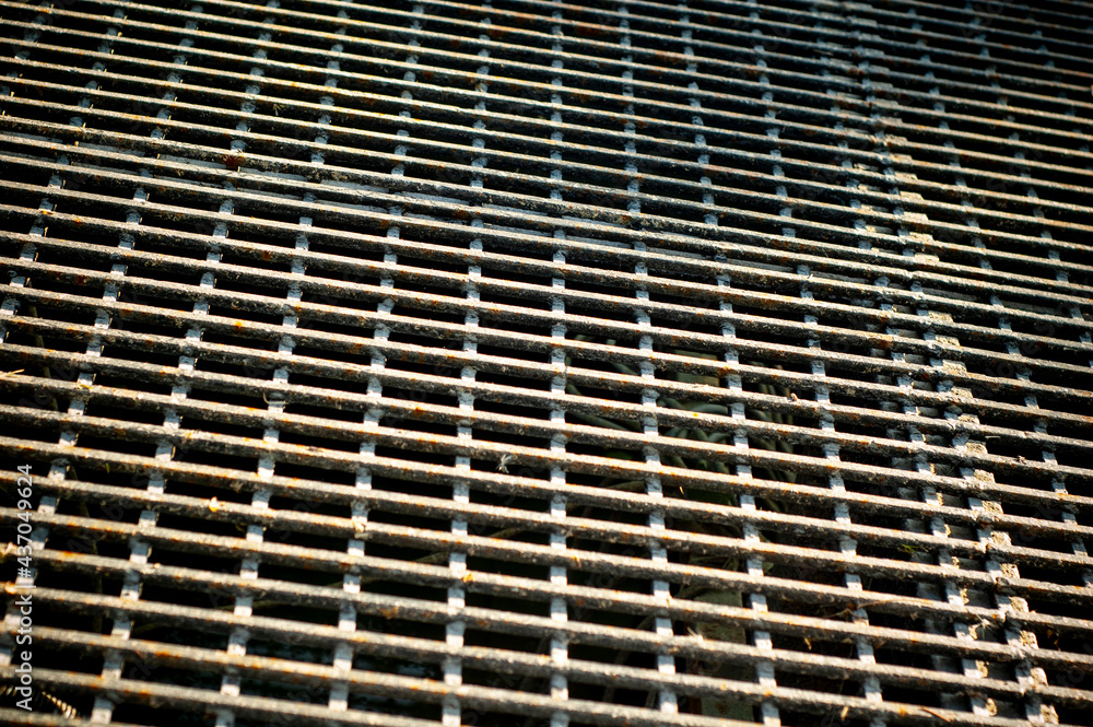 An iron mesh background. Metal grid texture An iron mesh background. Metal grid texture