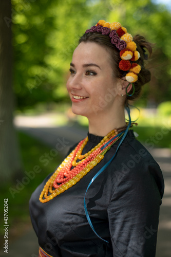 Young attractive woman in a wreath, portrait