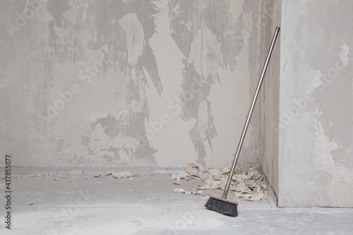 Картината върху платно Broom at wall in room