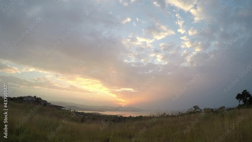 Spectacular Time lapse of sunset with sun rays on the moving clouds behind the mountains, Koh Samui view point, Thailand Spectacular Time lapse of sunset with sun rays on the moving clouds behind the mountains, Koh Samui view point, Thailand
