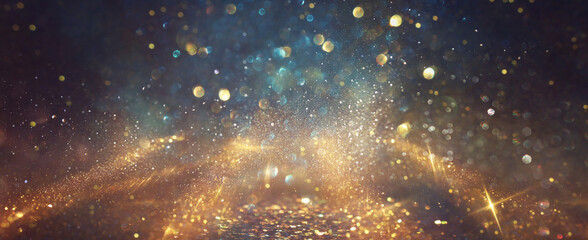 background of abstract glitter lights. gold, blue and black. de focused