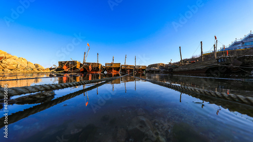 Wooden fishing boats dock in the harbor, North China