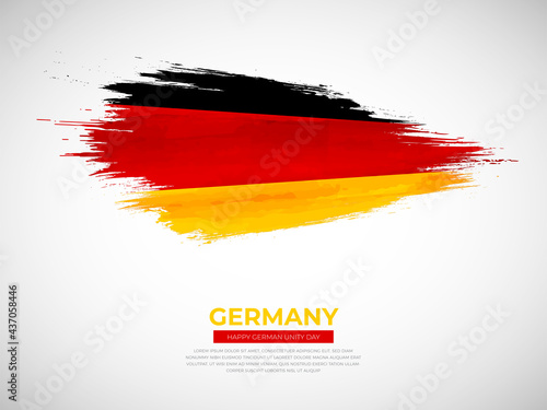 Grunge style brush painted Germany country flag illustration with german unity day typography