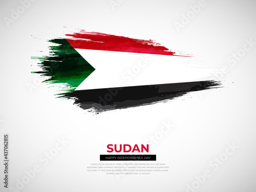 Grunge style brush painted Sudan country flag illustration with Independence day typography