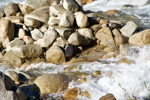 Round stones on the river.