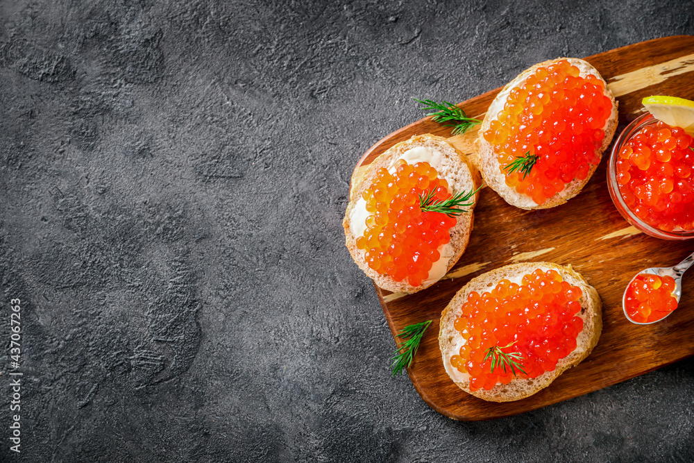 Delicious snack sandwiches with red caviar Delicious snack sandwiches with red caviar