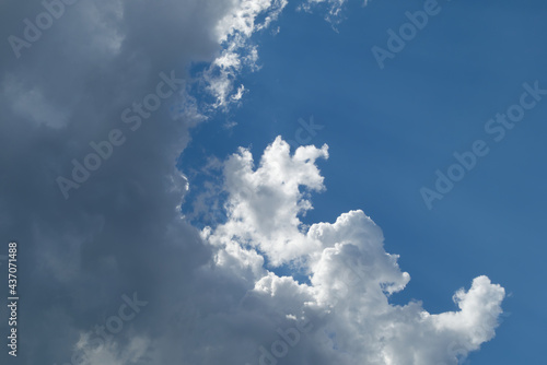 Beautiful clouds and blue skies. Light-dark contrast between dark clouds, clean white clouds and pure blue sky. Simply heavenly composition, spontaneously photographed. 
