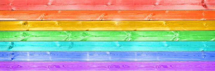 Pastel colorful rainbow painted wood planks panoramic background. Rainbow flag, LGBTQ pride month web banner