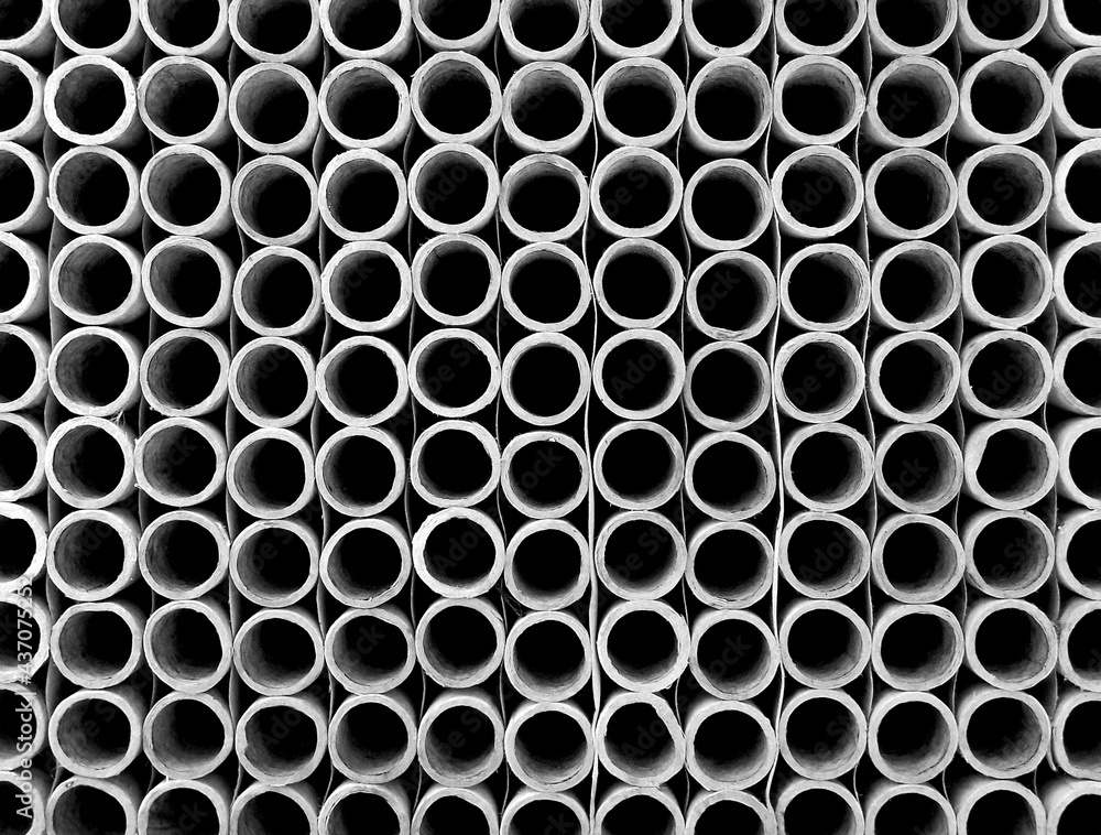 Abstract background of steel pipes stacked on a pallet Abstract background of steel pipes stacked on a pallet