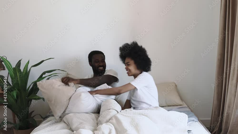 African american couple waking up in the morning African american couple waking up in the morning