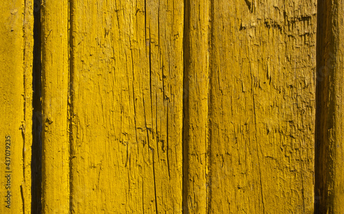 Wallpaper Mural Old, cracked, textured boards in a bright sunny yellow color. Torontodigital.ca