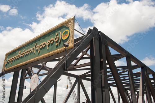 Sign of Mandalay bridge over river