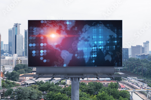 Photography World planet Earth map hologram on billboard over panorama city view of Kuala Lumpur, Malaysia, Asia