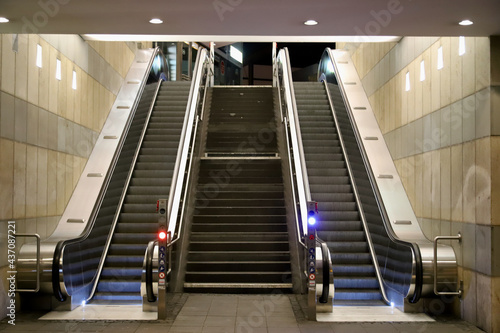 abandoned escalator downtown at night