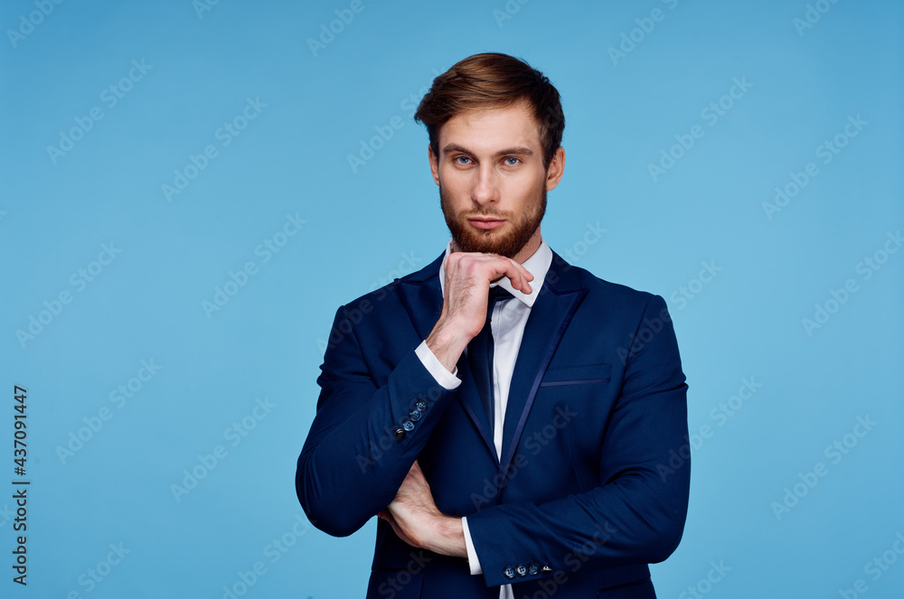 business man in suit blue background cropped view financial self-confidence business man in suit blue background cropped view financial self-confidence